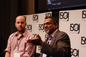 Robert Quigley, professor from UT-Austin, and Raju Narisetti, managing editor from the Wall Street Journal Digital Network, speaks during the 13th International Symposium on Online Journalism on Apr. 21, 2012. (Knight Center)