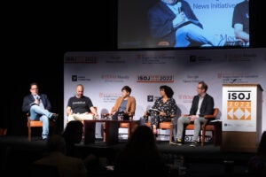 Five people on stage at ISOJ 2022 discussing news ecosystems.