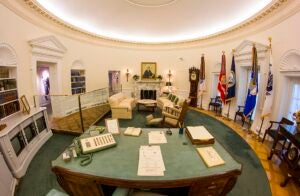 inside a replica of the Oval Office